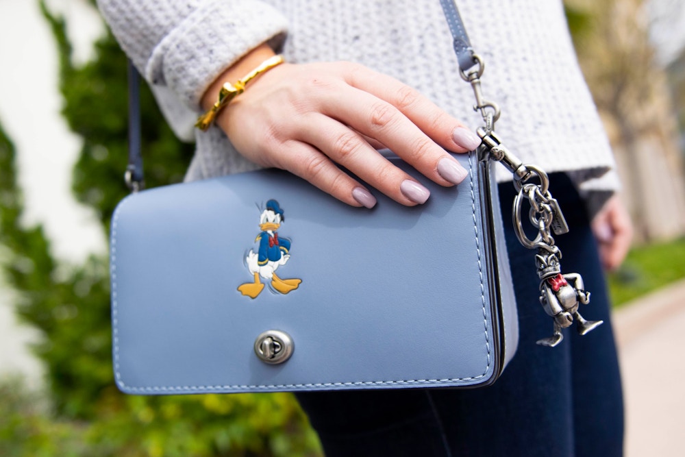The New Disney x COACH Line Featuring Donald Duck Is Selling Out