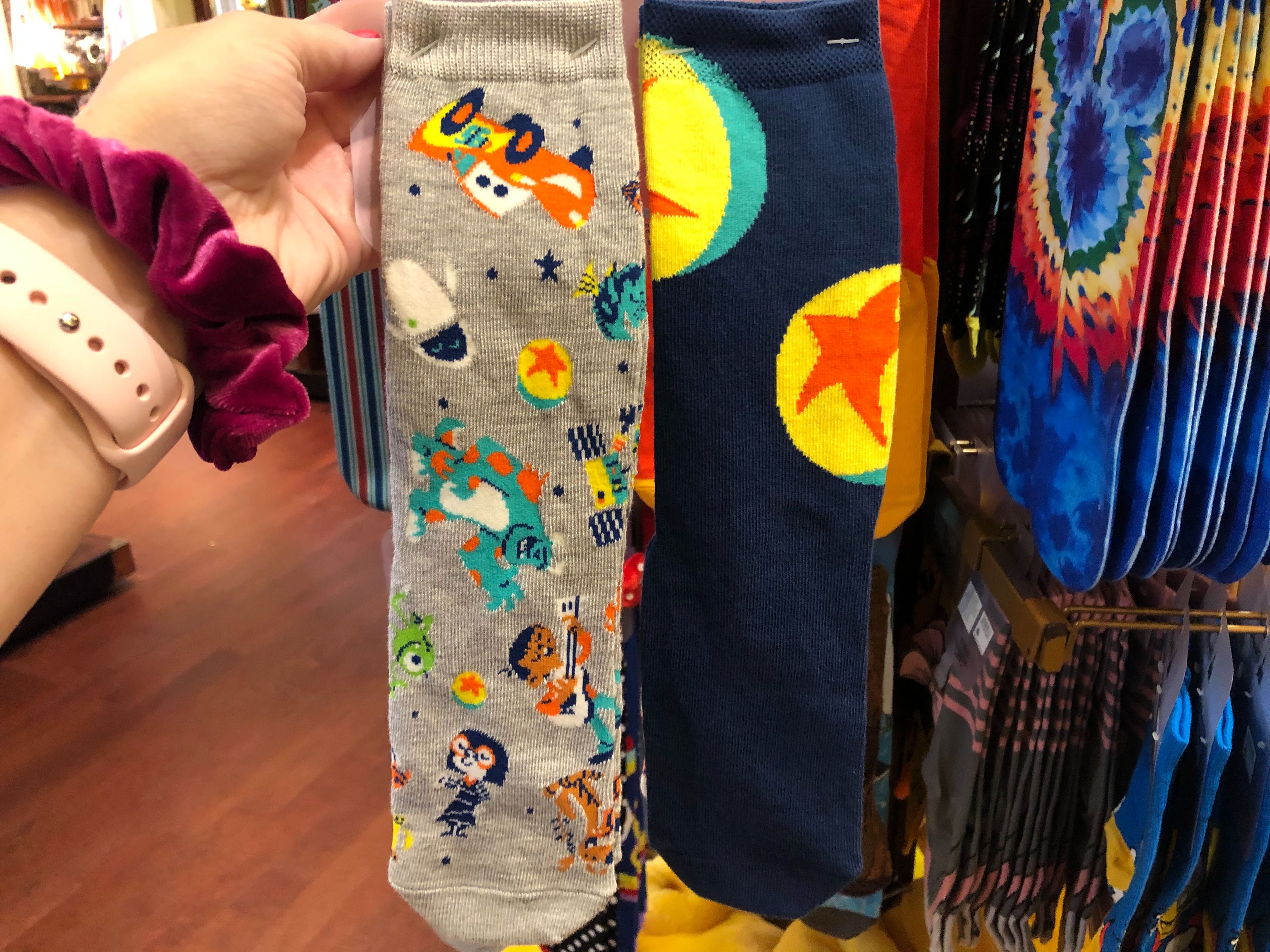 PHOTOS Another Round of "The World of PIXAR" Merchandise Comes to Disney Springs WDW News Today