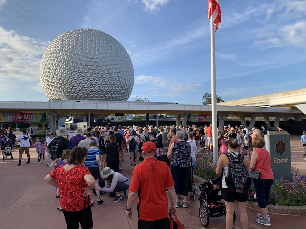 01 021220 Epcot Crowded Entrance.jpeg?auto=compress%2Cformat&fit=scale&h=750&ixlib=php 1.2