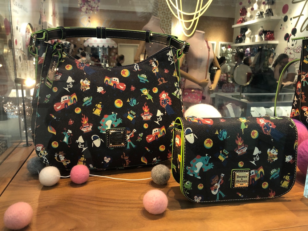 Dooney and Bourke World of Pixar Preview Disney Springs Feb2020 5.jpg?auto=compress%2Cformat&fit=scale&h=750&ixlib=php 1.2