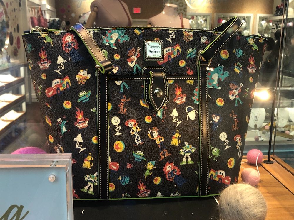 Dooney and Bourke World of Pixar Preview Disney Springs Feb2020 6.jpg?auto=compress%2Cformat&fit=scale&h=750&ixlib=php 1.2