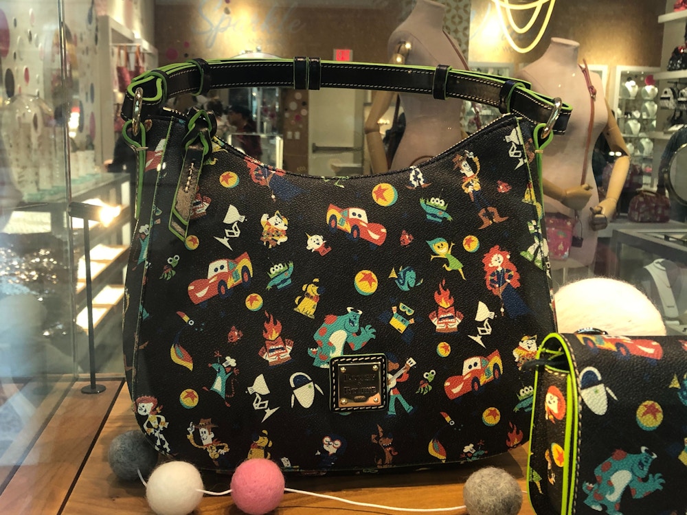 Dooney and Bourke World of Pixar Preview Disney Springs Feb2020 7.jpg?auto=compress%2Cformat&fit=scale&h=750&ixlib=php 1.2
