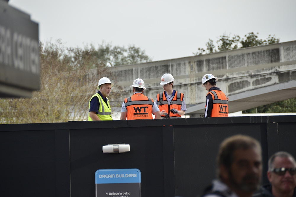 EPCOT Photo Report 2 5 20 workers above wall.JPG?auto=compress%2Cformat&fit=scale&h=667&ixlib=php 1.2