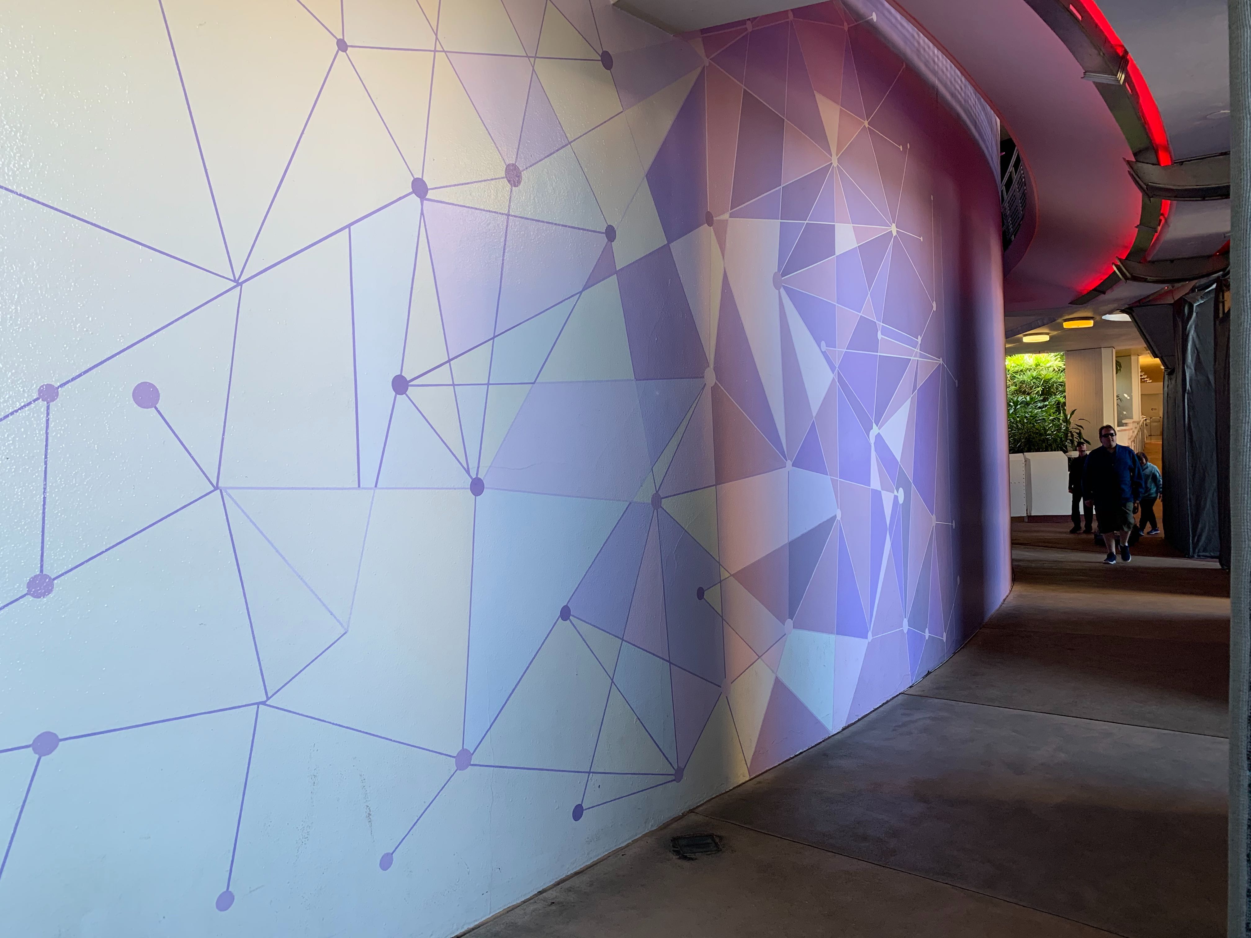 PHOTOS Purple Wall Photo Op Impacted by Ongoing Tomorrowland ReTheme