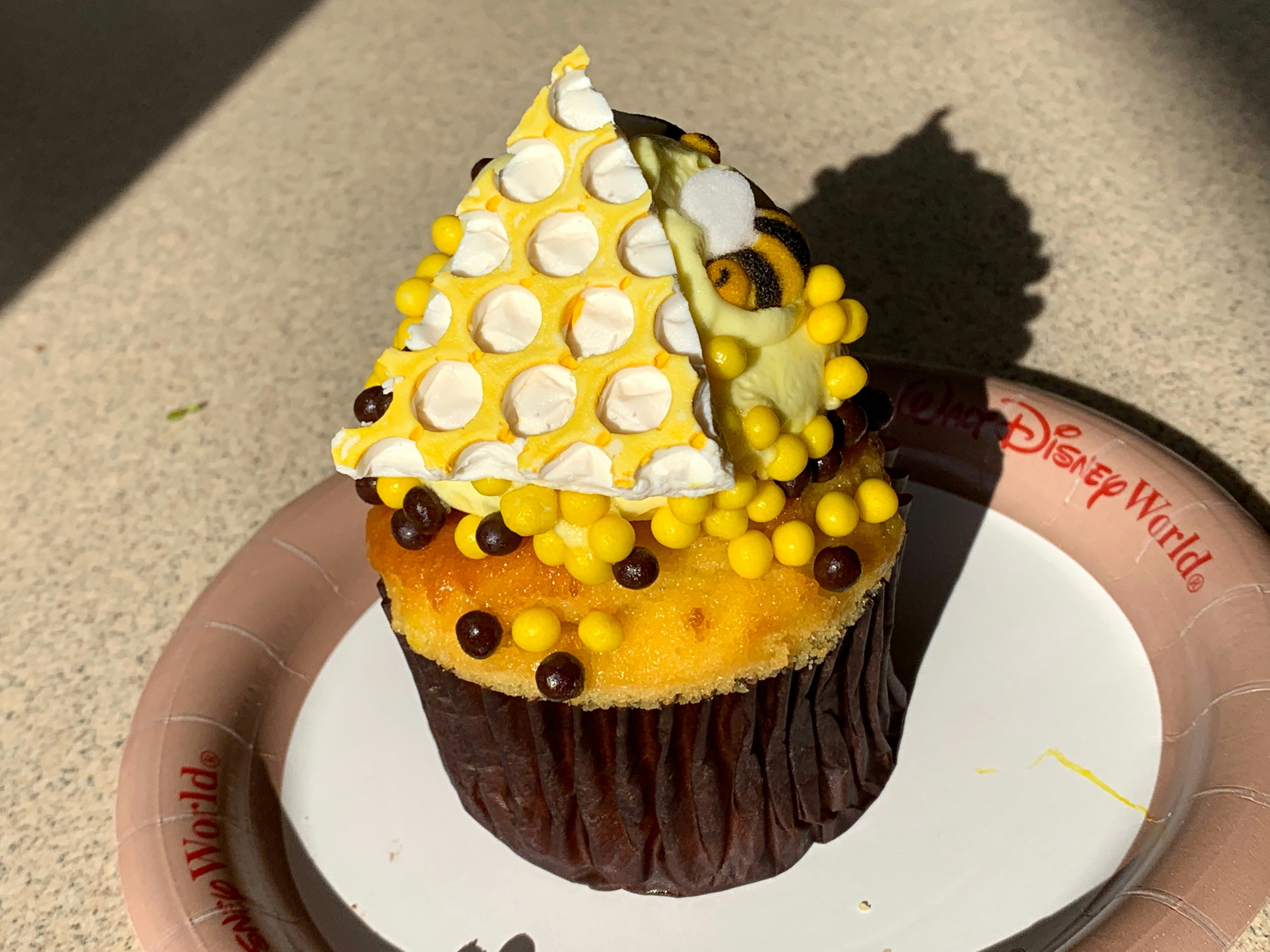 REVIEW: Delicious Orange-Honey Bee Cupcake Returns to Disney's Animal Kingdom 6 bee cupcake DAK 11.jpeg?auto=compress%2Cformat&ixlib=php 1.2