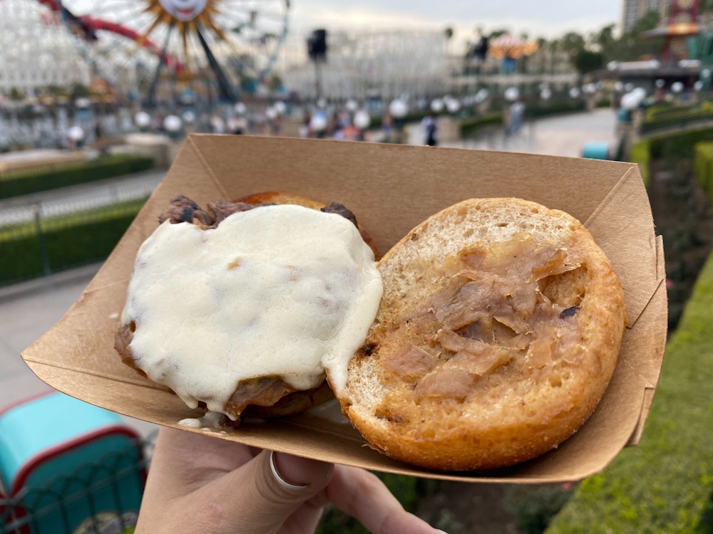 cluck a doodle moo 2020 disney california adventure food wine festival beef tenderloin slider 2.jpg?auto=compress%2Cformat&fit=scale&h=750&ixlib=php 1.2