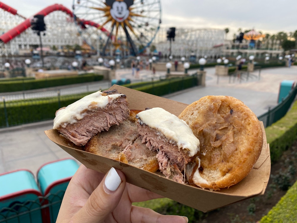 cluck a doodle moo 2020 disney california adventure food wine festival beef tenderloin slider 5.jpg?auto=compress%2Cformat&fit=scale&h=750&ixlib=php 1.2