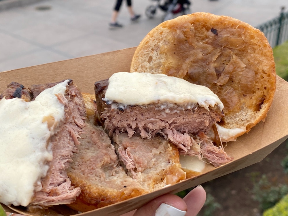 cluck a doodle moo 2020 disney california adventure food wine festival beef tenderloin slider 7.jpg?auto=compress%2Cformat&fit=scale&h=750&ixlib=php 1.2