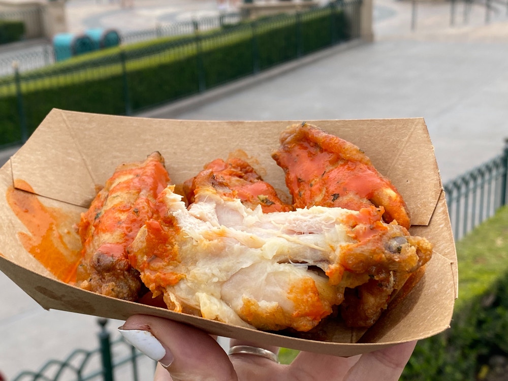 cluck a doodle moo 2020 disney california adventure food wine festival ranch fried chicken wings 6.jpg?auto=compress%2Cformat&fit=scale&h=750&ixlib=php 1.2