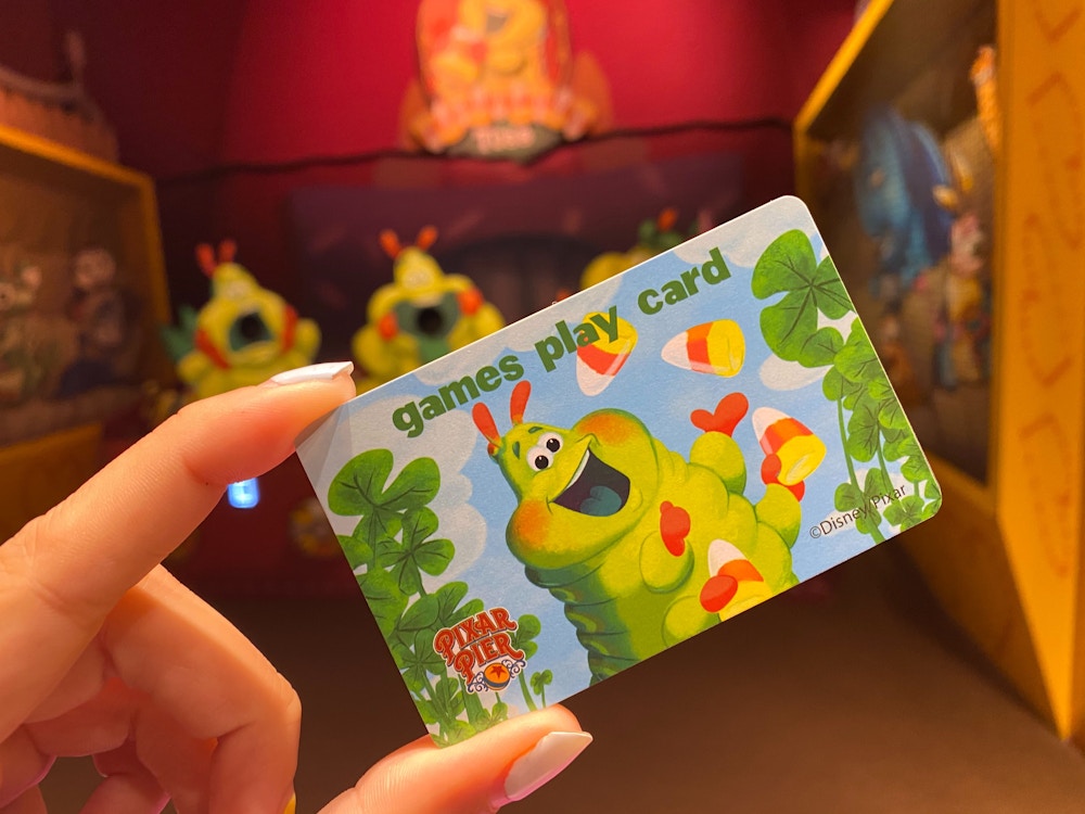 pixar pier games play card disney california adventure hemlich a bugs life 2.jpg?auto=compress%2Cformat&fit=scale&h=750&ixlib=php 1.2