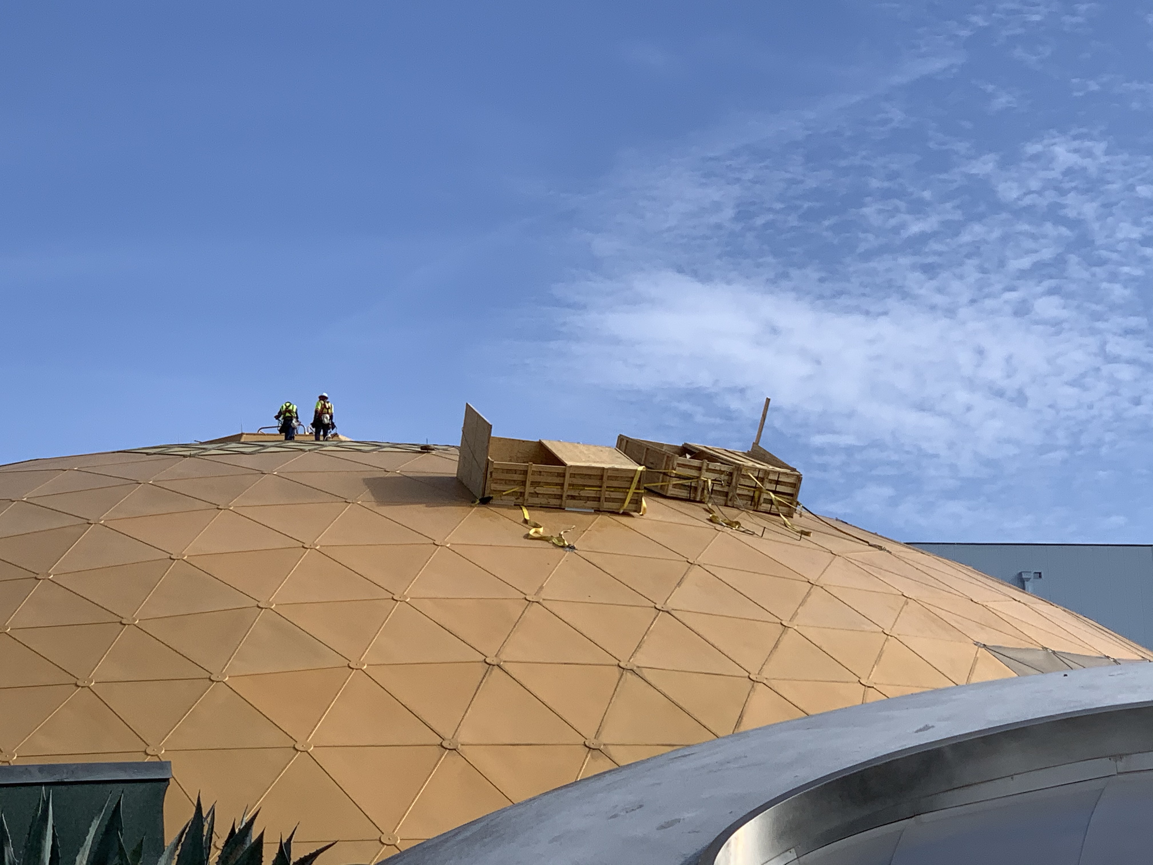 PHOTOS Work Continues on Roof of Former Wonders of Life, Play