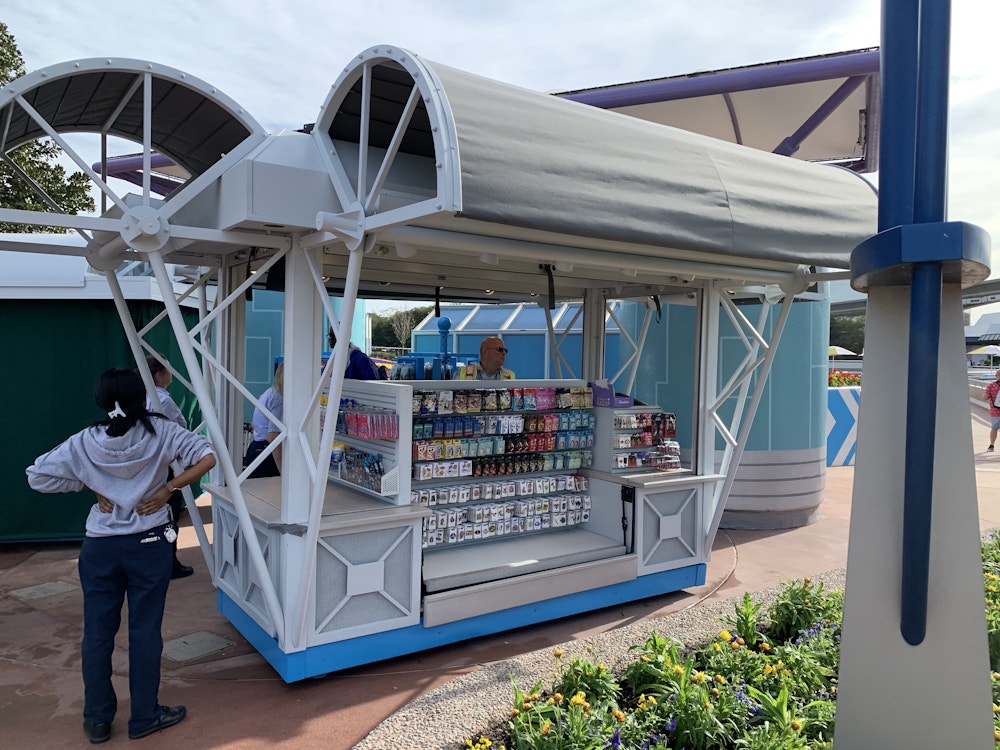 28 030320 EPCOT New Merch Booth.jpeg?auto=compress%2Cformat&fit=scale&h=750&ixlib=php 1.2