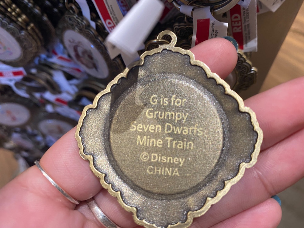 ABCDisney Keychains G Grumpy Seven Dwarfs Mine Train 2.jpg?auto=compress%2Cformat&fit=scale&h=750&ixlib=php 1.2