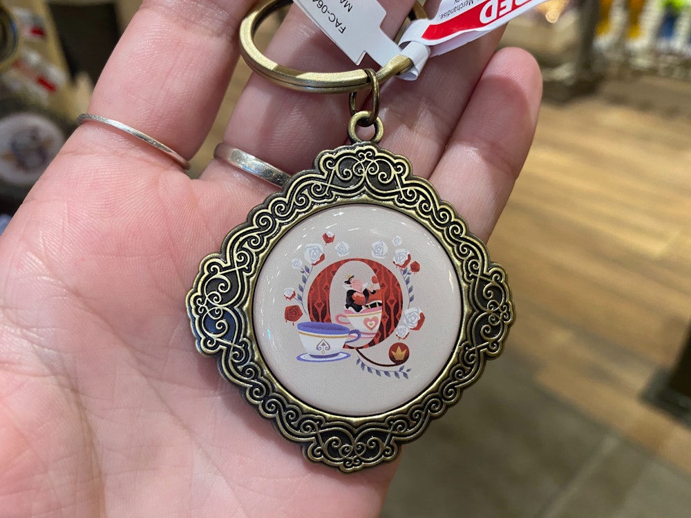 ABCDisney Keychains Q Queen of Hearts Mad Tea Party 1.jpg?auto=compress%2Cformat&fit=scale&h=750&ixlib=php 1.2
