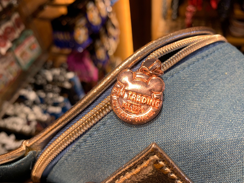 PHOTOS: Trade Pins In Style With These Brand New Pin Trading Bags