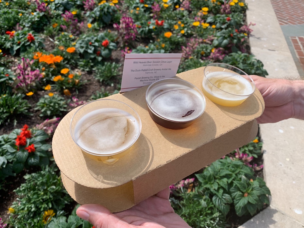 beer flight magnolia terrace 2020 epcot international flower garden festival 2.jpg?auto=compress%2Cformat&fit=scale&h=750&ixlib=php 1.2