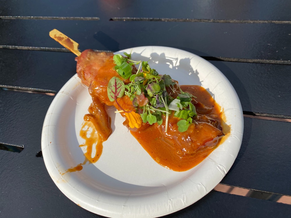 REVIEW: Bon Bon Chicken Skewer, Marco Boba, and More at Lotus House at the 2020 EPCOT International Flower & Garden Festival 13 bon bon chicken skewer lotus house 2020 epcot international flower garden festival 7.jpg?auto=compress%2Cformat&fit=scale&h=750&ixlib=php 1.2