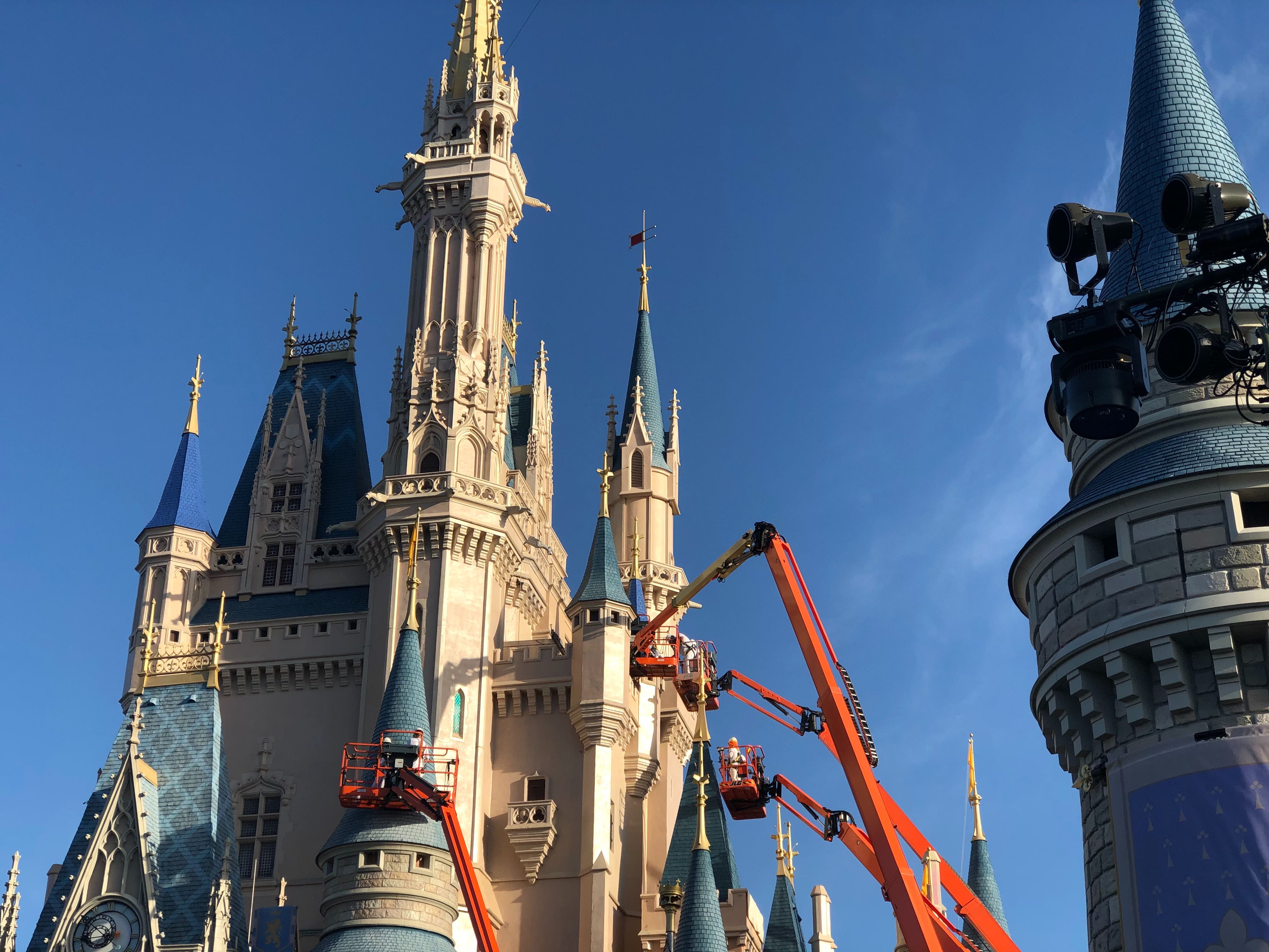 PHOTOS First Pair of Repainted Turrets Complete on Cinderella Castle