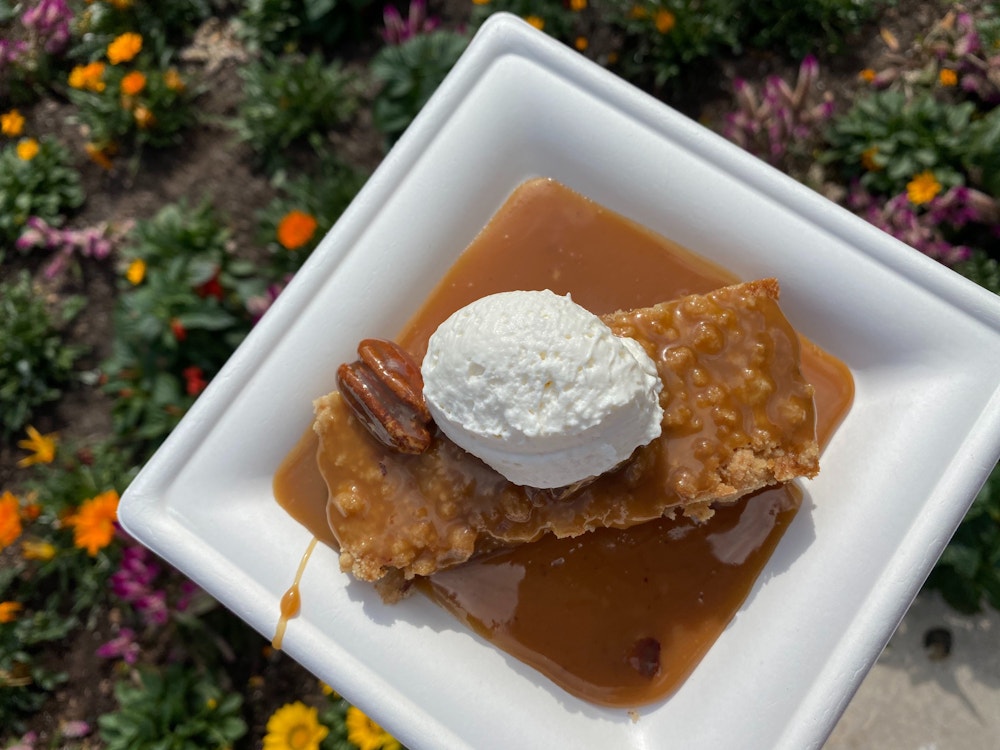 pecan cake magnolia terrace 2020 epcot international flower garden festival 10.jpg?auto=compress%2Cformat&fit=scale&h=750&ixlib=php 1.2