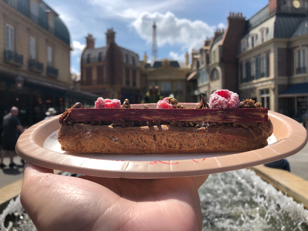 raspberry eclair fleur de lys 2020 epcot international flower garden festival 2.jpg?auto=compress%2Cformat&fit=scale&h=750&ixlib=php 1.2