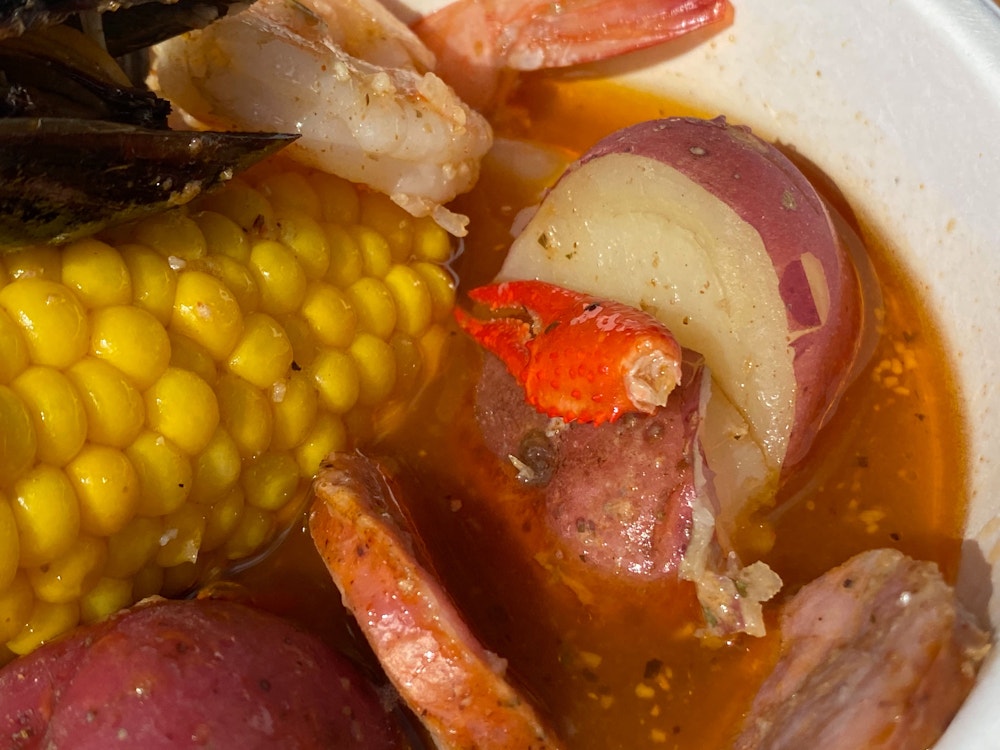 southern seafood boil magnolia terrace 2020 epcot international flower garden festival 11.jpg?auto=compress%2Cformat&fit=scale&h=750&ixlib=php 1.2