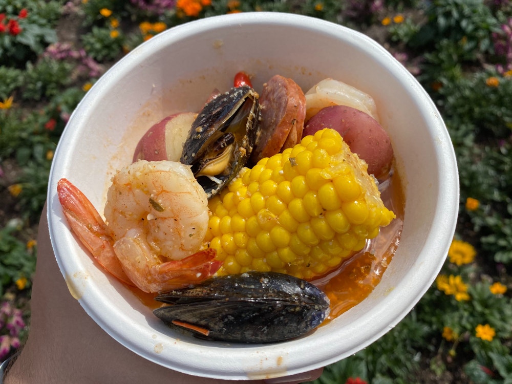 southern seafood boil magnolia terrace 2020 epcot international flower garden festival 7.jpg?auto=compress%2Cformat&fit=scale&h=750&ixlib=php 1.2