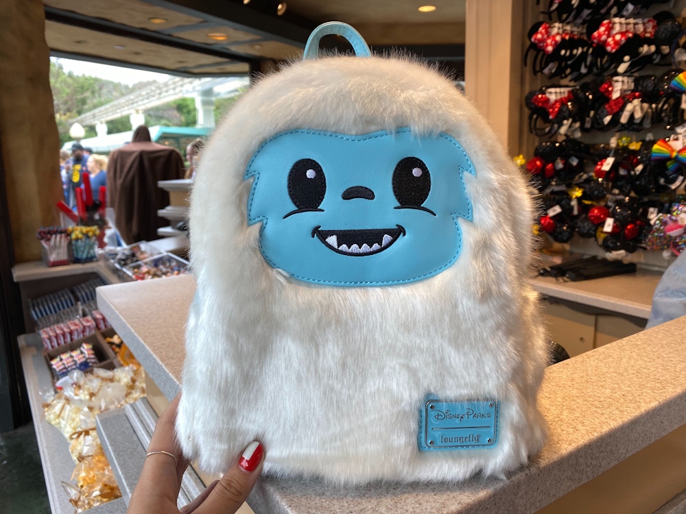 yeti abominable snowman loungefly backpack le petit chalet disneyland 3.jpg?auto=compress%2Cformat&fit=scale&h=750&ixlib=php 1.2