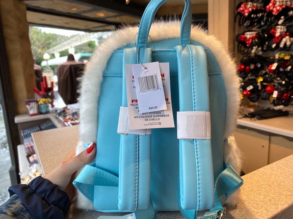 yeti abominable snowman loungefly backpack le petit chalet disneyland 7.jpg?auto=compress%2Cformat&fit=scale&h=750&ixlib=php 1.2
